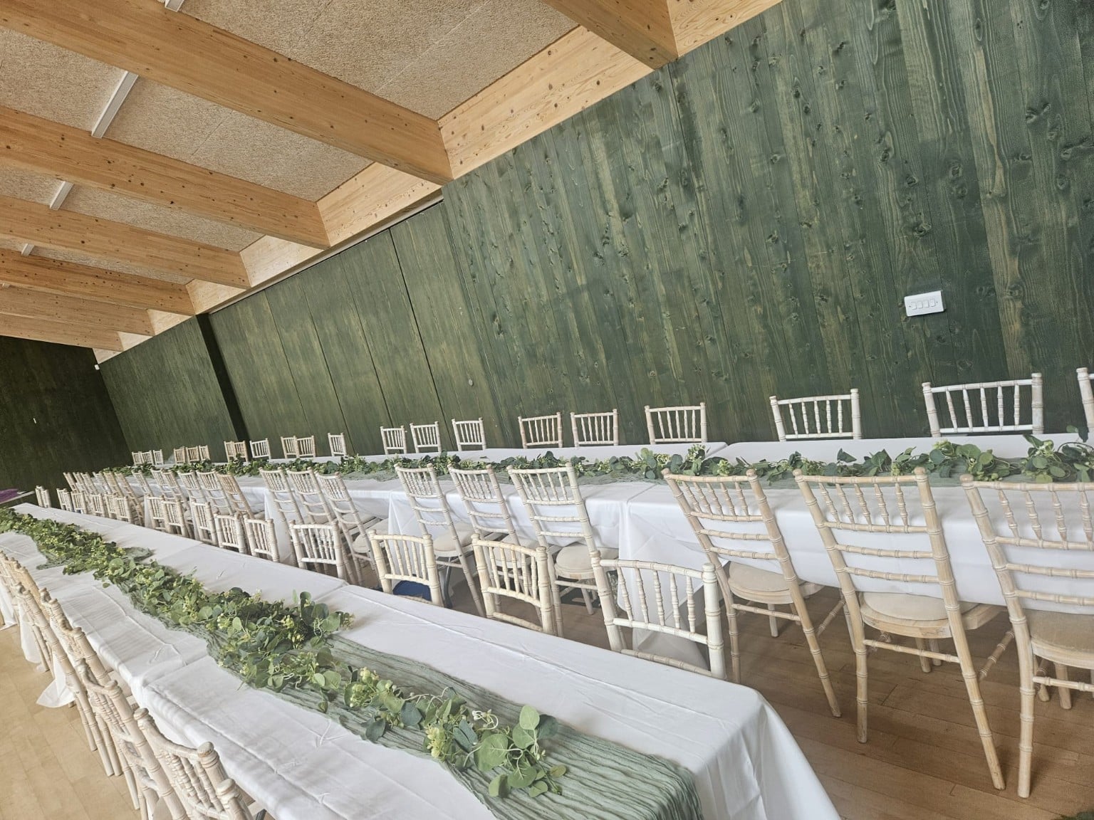 Tables white linen and Limewash Chiavari chairs supplied by Kylah Group at Sands End Arts and Community Centre Fulham